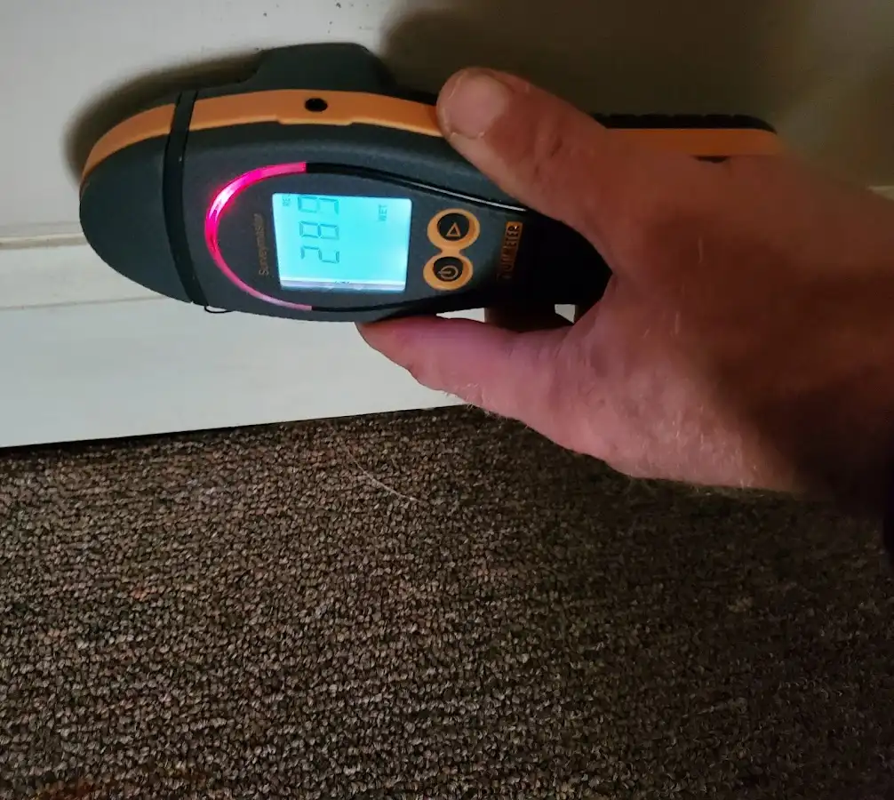 Moisture detection at baseboard during Sewage Cleanup & Sanitation in La Riviera